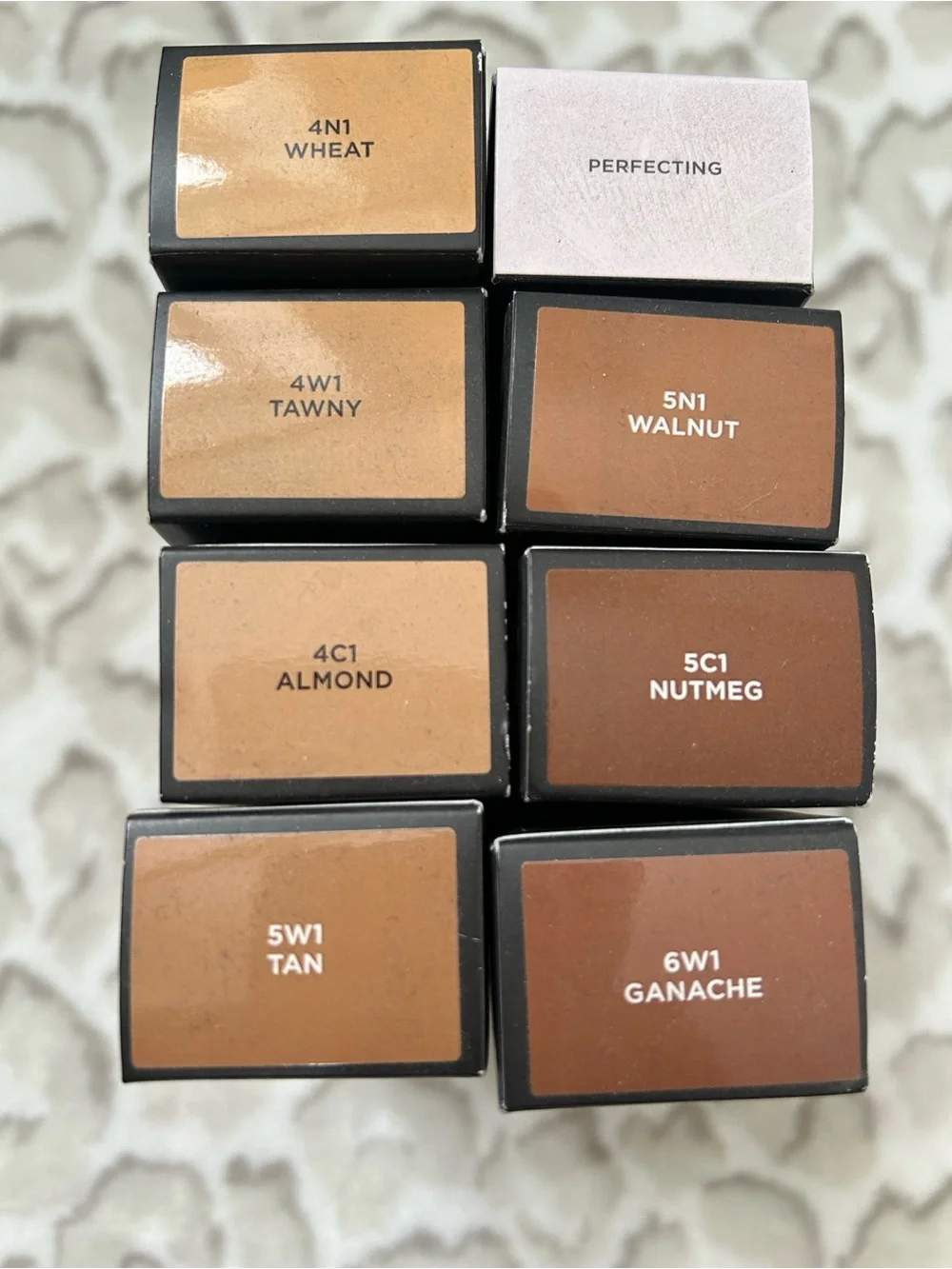 laura mercier Tinted Moisturizer Oil-Free in Warm Tan / Black Tube
